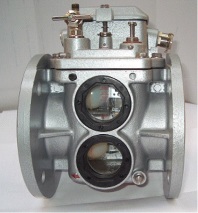 The Buchholz relay is a cylindrical tank with a float inside. The float is connected to a switch, which is opened if the level of oil in the tank rises too high. This indicates that there is a fault in the transformer, such as a short circuit or overheating.