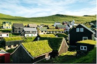 Nearly every house and farm use cool roofs, houses with grassy thatched roofs, in Mykines, Faroe Islands.